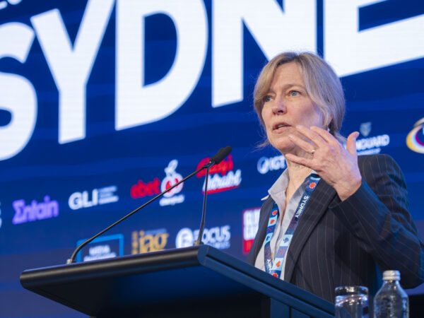 Tracy presenting on Smarter Approaches to Affordability and Overspending at the 2026 Regulating the Game Conference.