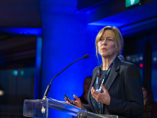 Tracy sharing Prevent at the Regulating the Game Pitch! Event at the Sydney Opera House.